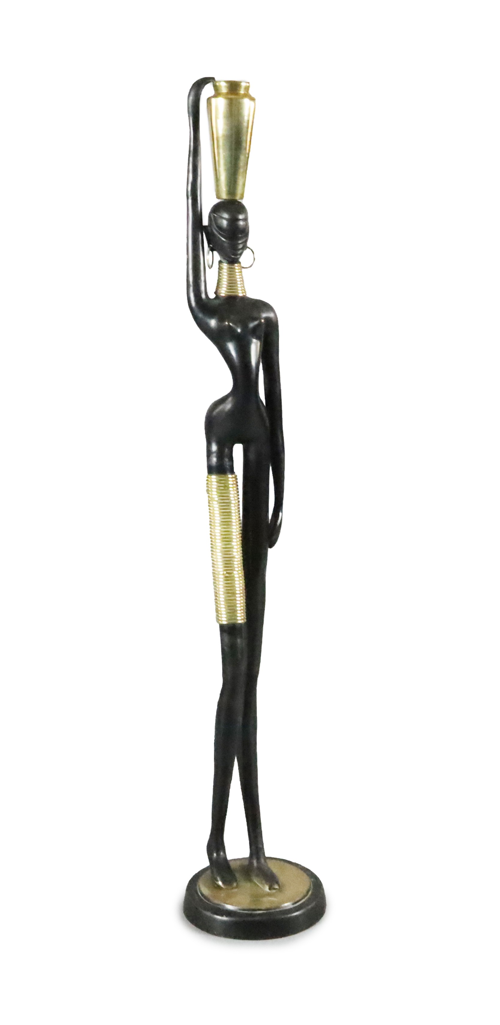 Karl Hagenauer. A brass and ebonised bronze figure of an African water carrier, H 117cm.